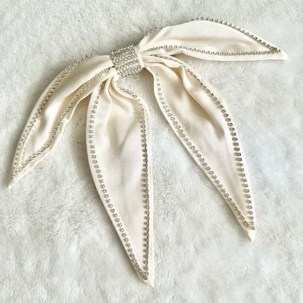Off white rhinestone embellished hair bow